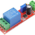 NE555 Timer Switch Adjustable Module Time Delay Relay Module DC 12V - a red circuit board featuring a blue relay, a black capacitor, a blue potentiometer, and green terminal blocks.