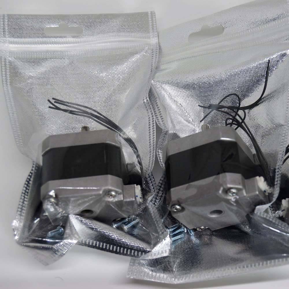 NEMA 17 4 Wire Stepper Motor NEMA17 Stepper Motor REFIRBISHED - shown as two silver and black motors with attached wires, each sealed in individual silver anti-static bags.