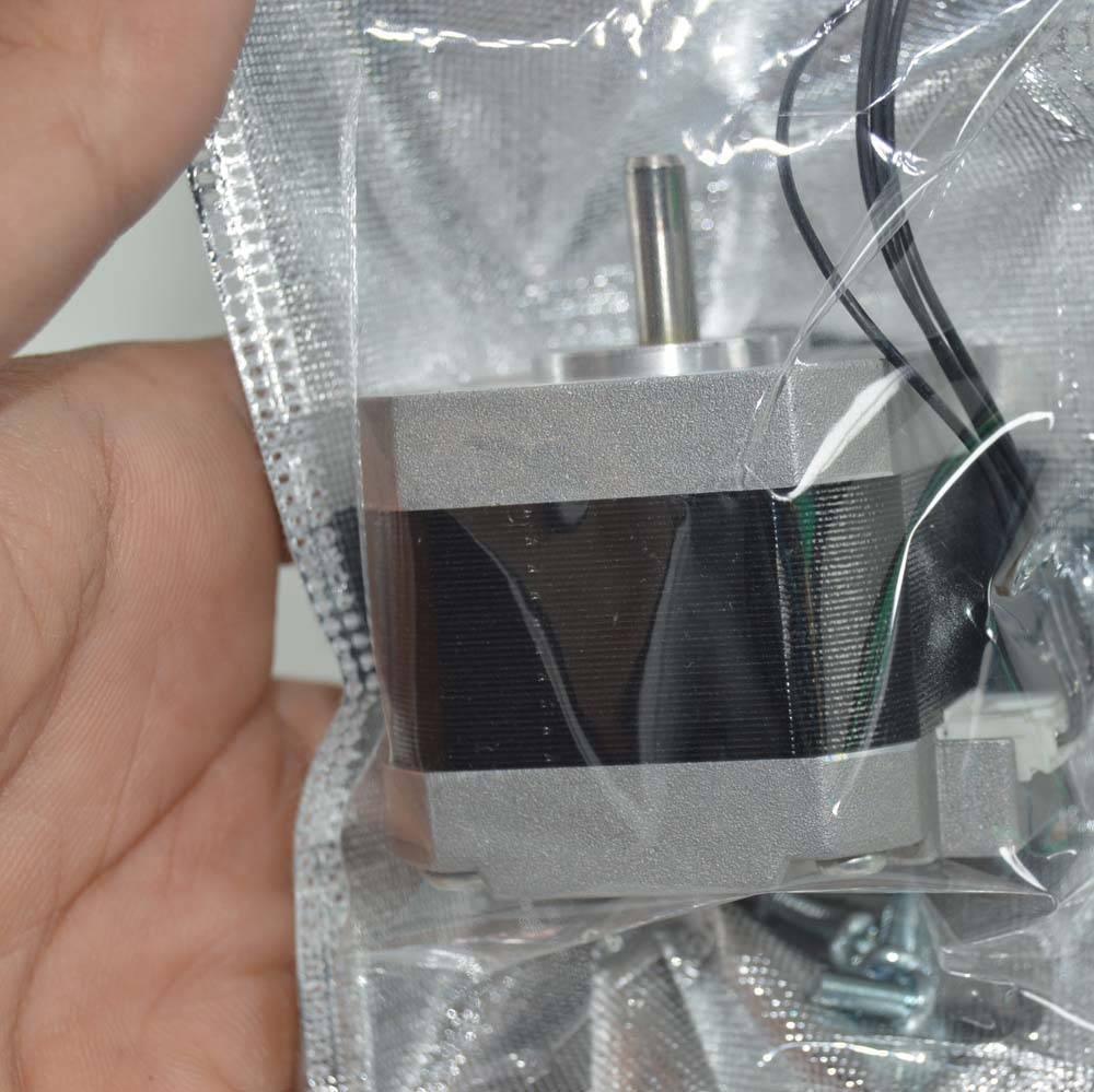 NEMA 17 4 Wire Stepper Motor NEMA17 Stepper Motor REFIRBISHED - shown inside a clear plastic anti-static bag with a silver metallic body, a top shaft, and a white connector.