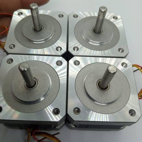 NEMA 17 Single Shaft 1.8 Degree Compact Powerful Stepper Motor - shown as a set of four silver metal square motors with central shafts and wire leads.
