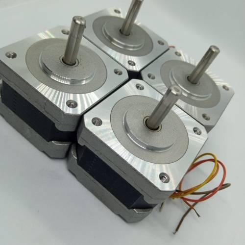 NEMA 17 Single Shaft 1.8 Degree Compact Powerful Stepper Motor - four silver and black square stepper motors with shafts and attached wire leads.