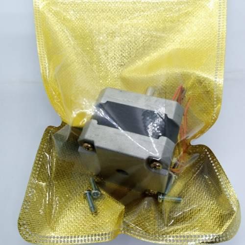 NEMA 17 Single Shaft 1.8 Degree Compact Powerful Stepper Motor - shown inside a gold anti-static bag with two small metal screws placed below it.