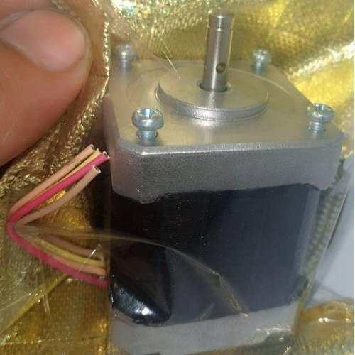 NEMA 17 Stepper Motor: Bipolar 1.8 Degree, 1.6 Ohm For 3d Printer Robotics 4 Wire - close-up view of the silver metal motor body, shaft, and four colored wires, partially wrapped in gold protective packaging.