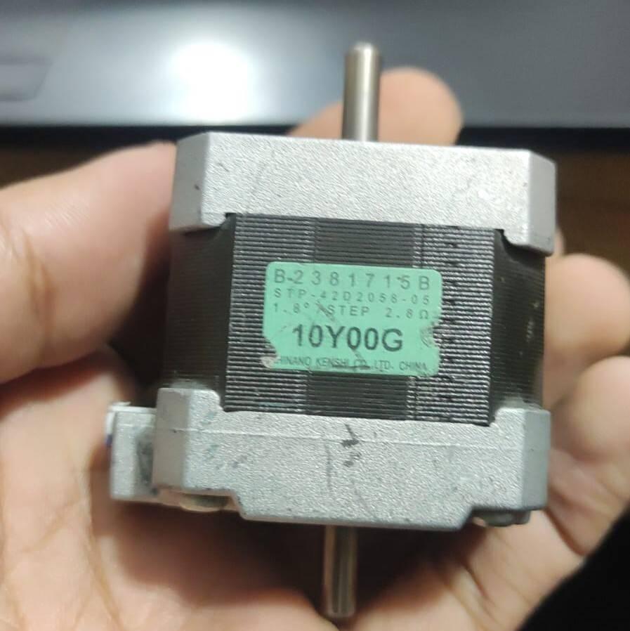 NEMA 17 Stepper Motor Dual Shaft Model B-2381715B - a grey metal body with a green label detailing model specifications and 1.8° step.
