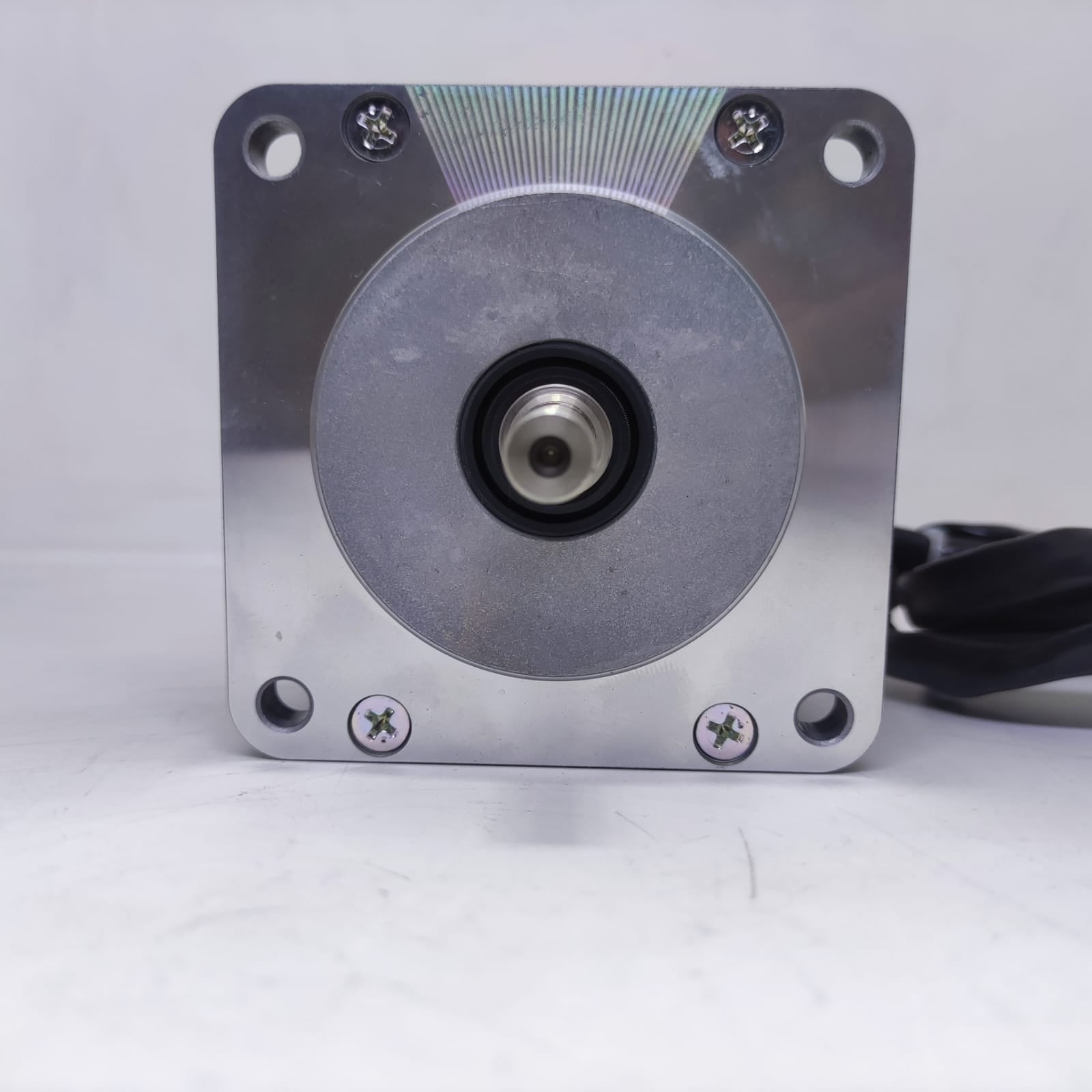 NEMA 34 Stepper Motor PK296-02A-A4 | Made In Japan | Digilog.pk - front view showing the square silver metal face, central rotating shaft, four mounting holes, and black cabling.