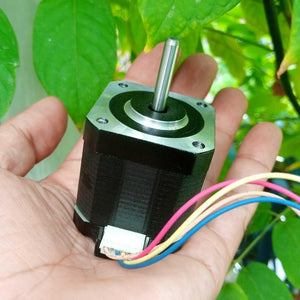 NEMA17 Stepper Motor 1.5A Maximum 48mm Height A4988 DRV8825 Compatible Bipolar Stepper Motor - with a silver shaft, held in a hand, featuring a white four-pin connector.