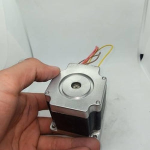 NEMA23 Bipolar 1.8 Degree 2A Stepper Motor Compatible With TB6560 - shown from a top-down angle, featuring a silver square faceplate and multi-colored wires extending from the back.