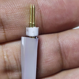 Neon Light Connector Pin - a close-up showing a white plastic connector with two gold-coloured metal pins attached to a piece of white LED neon strip.