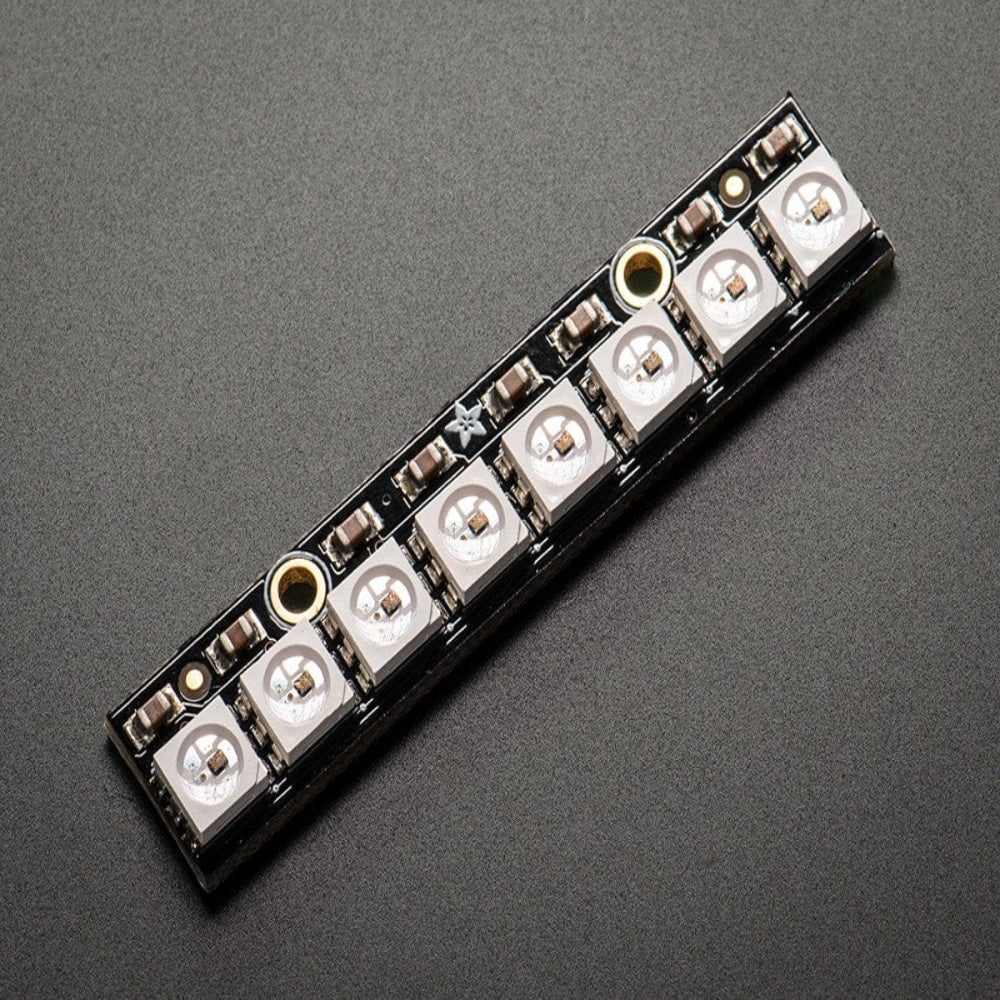 NeoPixel Stick 8x5050 RGB LED with WS2812 Driver - 8-Bit LED Strip Module - a black rectangular circuit board featuring eight square RGB LEDs arranged in a single straight row.