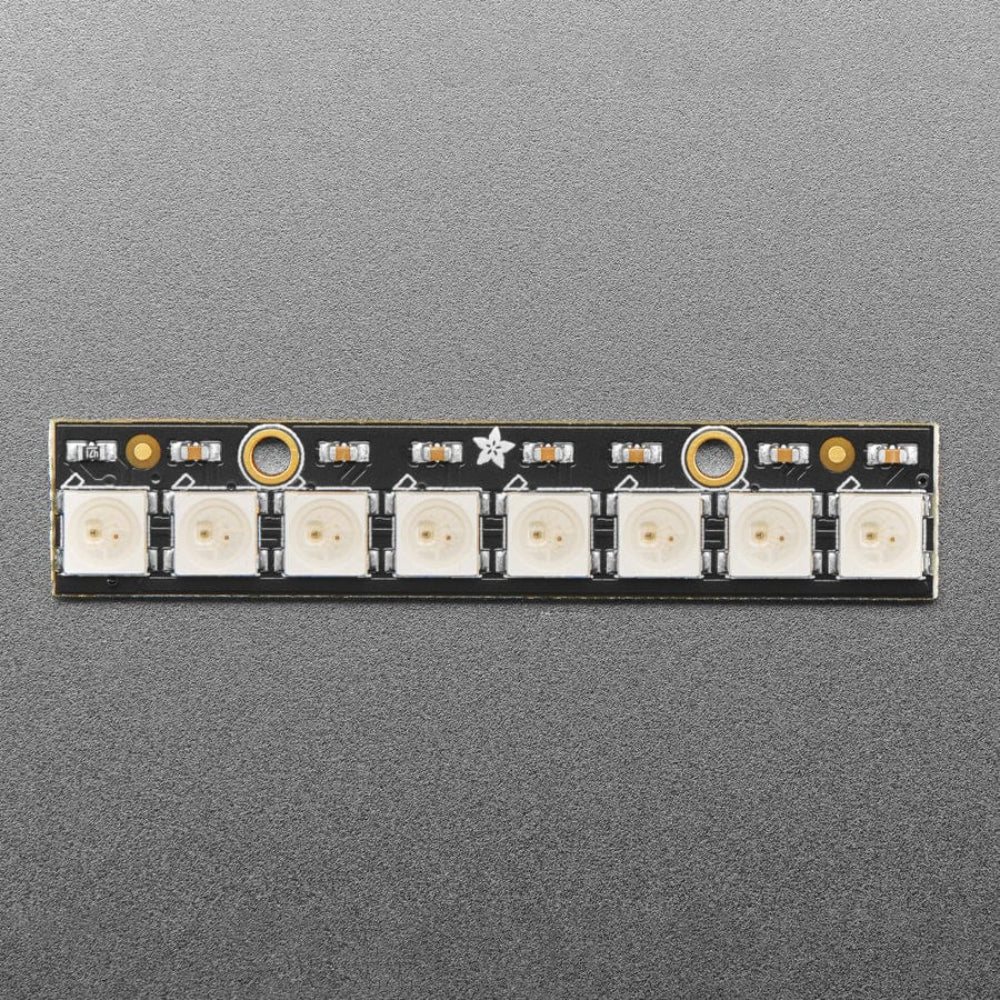 NeoPixel Stick 8x5050 RGB LED with WS2812 Driver - 8-Bit LED Strip Module - a rectangular black circuit board featuring eight square white LEDs arranged in a single row.