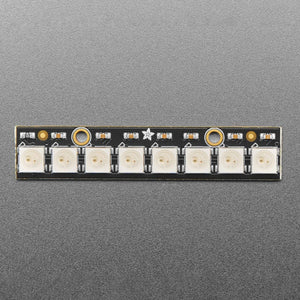 NeoPixel Stick 8x5050 RGB LED with WS2812 Driver - 8-Bit LED Strip Module - a rectangular black circuit board featuring eight square white LEDs arranged in a single row.
