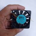 NEW 24V 60mm x 60mm x 15mm Brushless DC Cooling Fan - the black square frame, blades, and the Nidec Beta SL label with specifications.