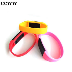 NFC IC 125kHz Bracelet RFID - shown as three silicone wristbands in yellow, red, and pink, each featuring a rectangular black central module.