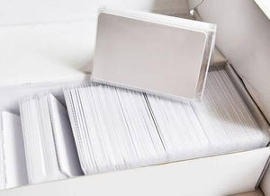 NFC Tag 13.56MHz RFID Card RFID Tag 1k Memory - shown as a large stack of blank white rectangular plastic cards inside a white cardboard box.