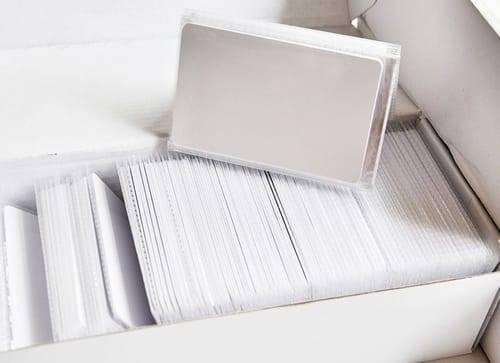 NFC Tag 13.56MHz RFID Card RFID Tag 1k Memory - shown as a large stack of blank white rectangular plastic cards inside a white cardboard box.