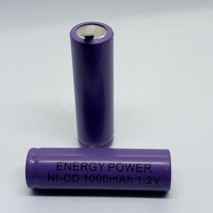Ni-Cd AA Cell Rechargeable Battery 1000mAh 1.2V - shown as two purple cylindrical batteries with one standing upright and one lying horizontally.