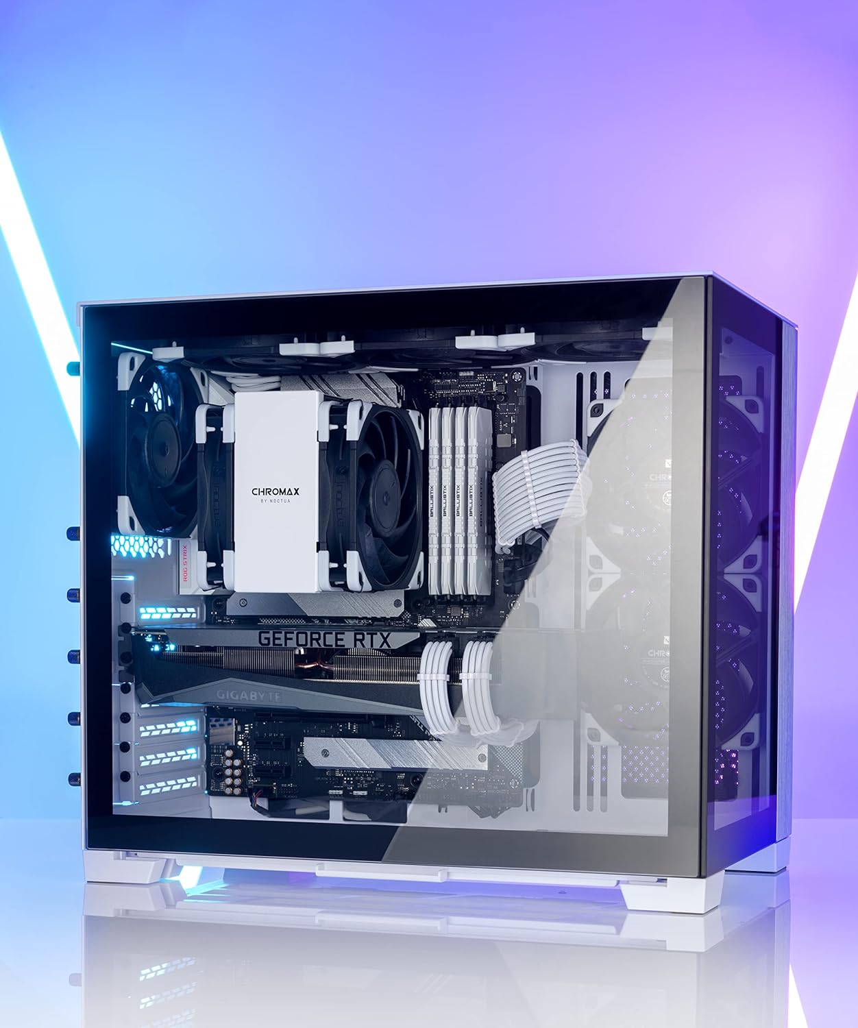 Noctua NA-SAVP1 chromax.White, Anti-Vibration Pads - installed on the black cooling fans of a white CPU cooler inside a desktop computer case.