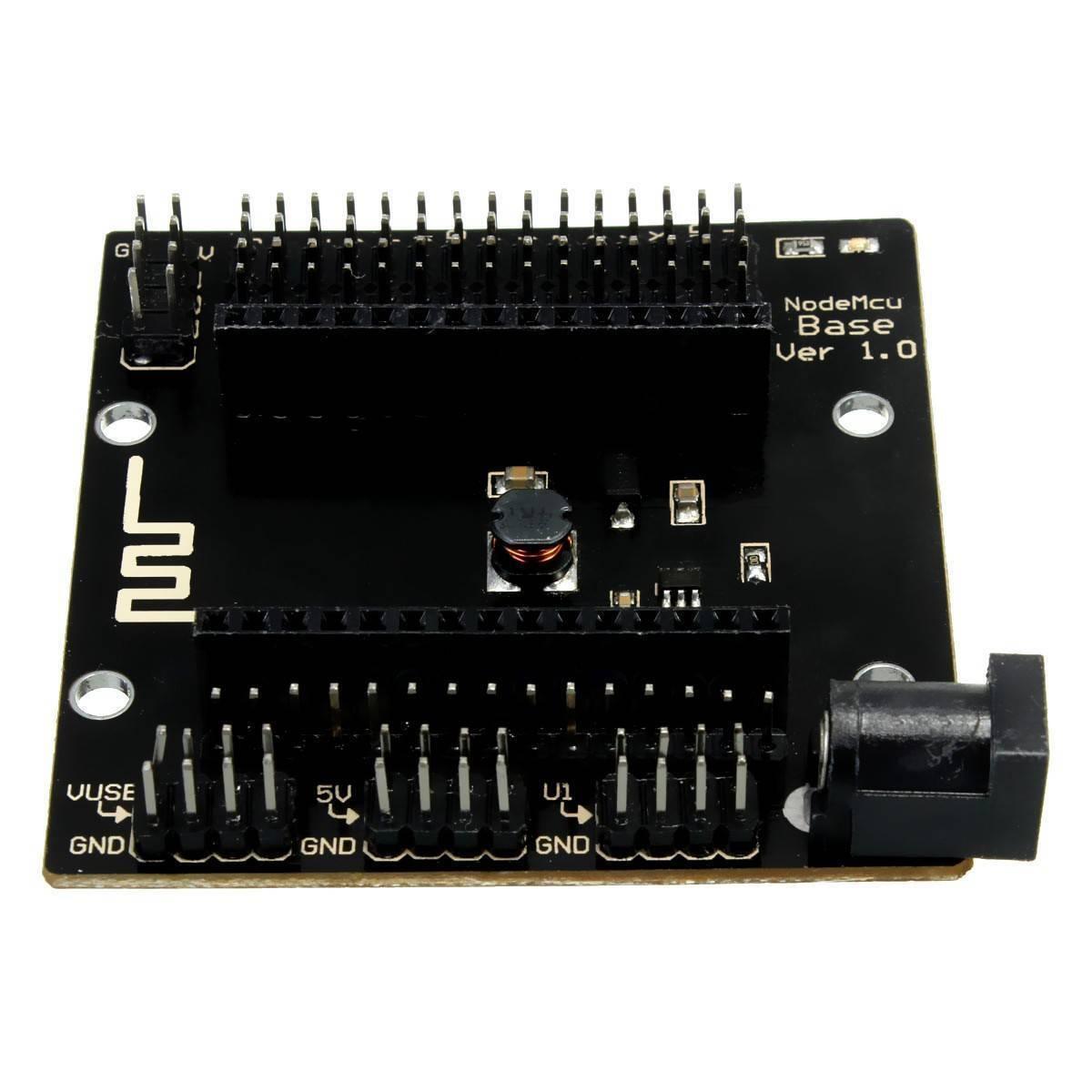 NodeMcu Sensor Shield GPIO Board - a black rectangular expansion board featuring two rows of pin headers, a DC power jack, and labeled GND pins.