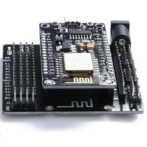 NodeMcu Sensor Shield GPIO Board - a black PCB with a mounted NodeMcu module, multiple pin headers, and a DC power jack.