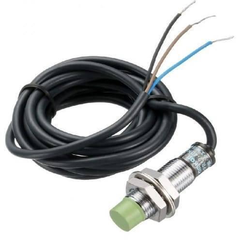 NPN PR12-4dn Autonics Cylindrical Inductive Proximity Sensor - shown as a silver metal threaded cylinder with a green tip and three attached wires.