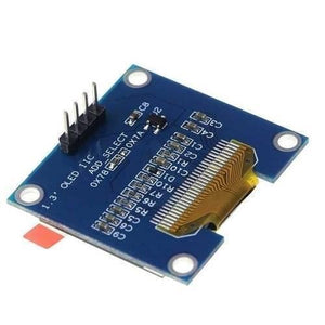 OLED 1.3 Inch Display Module 128x64 I2C Communicate 4pin SSD1106 Blue Text Color - the blue circuit board, a four-pin header, and the flat flexible cable connector on the back.