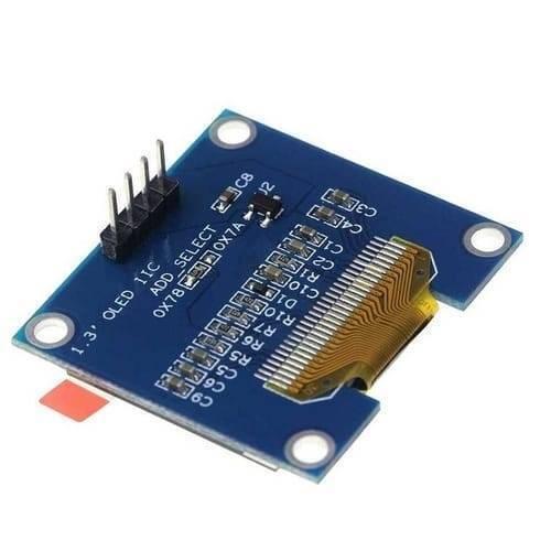 OLED 1.3 Inch Display Module 128x64 I2C Communicate 4pin SSD1106 Blue Text Color - the blue circuit board, a four-pin header, and the flat flexible cable connector on the back.