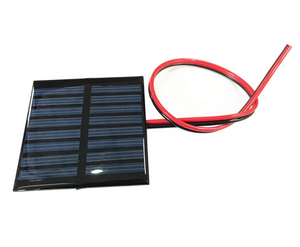 On Demand 4V 5V 5.5V Solar Panels – DIY Battery Cell Phone Charger | Digilog.pk - a rectangular black solar panel with a blue grid pattern and two attached red and black wires.