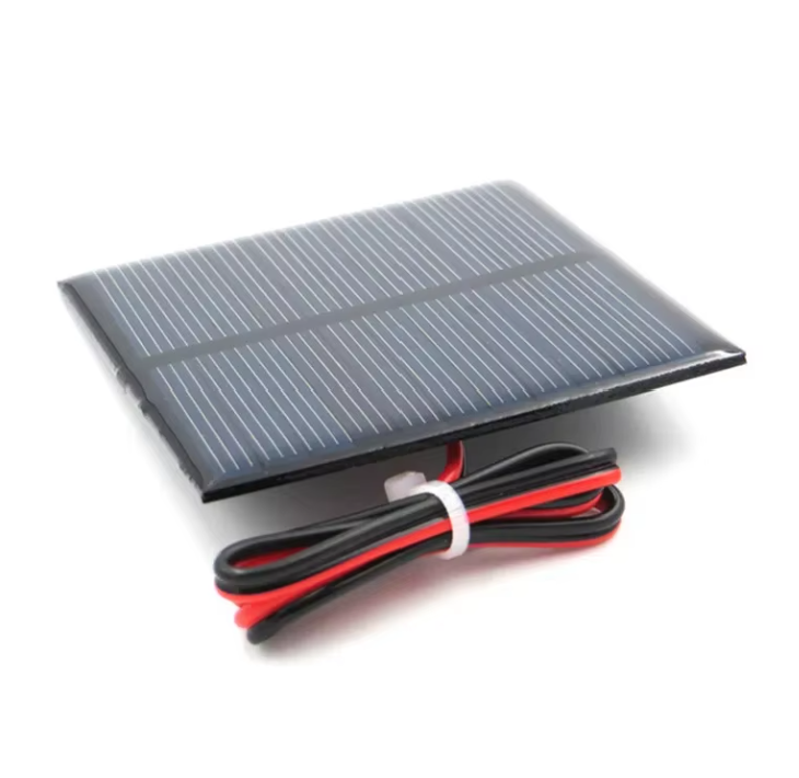 On Demand 4V 5V 5.5V Solar Panels – DIY Battery Cell Phone Charger | Digilog.pk - a rectangular black solar panel with a coiled red and black wire lead tied with a white plastic zip tie.