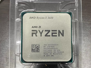 On-Demand AMD Ryzen R5 3600 Processor | 6-Core 12-Thread CPU for Gaming And Work - a silver square CPU with laser-etched model information, shown inside a clear plastic protective clamshell packaging.