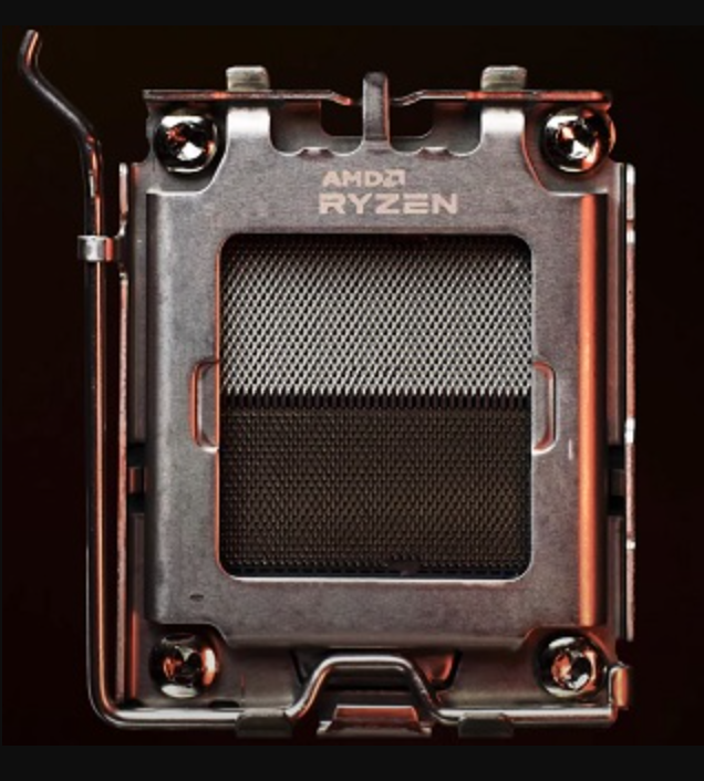 On Demand AMD Ryzen R7 9700X Processor 8 cores and 16 threads - a top-down close-up view of the metallic CPU socket housing with a silver locking lever on the left side.