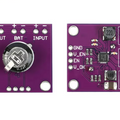 On Demand BQ25570 Energy Harvester Module with Boost Charger and Buck Converter | Digilog.pk - top and bottom views of the purple circuit board featuring a capacitor, inductor, and labeled input/output terminals.