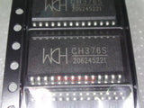 On Demand CH376S USB Read and Write IC – SOP-28 Package - a close-up of two black SOP-28 integrated circuits marked with "WCH" and "CH376S" sitting in a black plastic shipping tray.