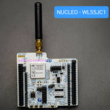 On Demand NUCLEO-WL55JC1 Nucleo-64 Development Board STM32WL55JCI Dual-Core ARM Cortex-M4/M0+ (LoRa & Sub-GHz) - with a black antenna attached, featuring a white PCB, dual pin headers, a metal radio module, and onboard buttons.