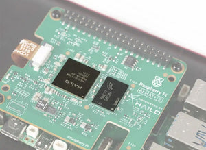 On-demand Official Raspberry Pi AI HAT+ 2, Built-in Hailo-10H AI Accelerator And 8GB Onboard RAM, Comes With Heatsink - a green circuit board featuring two square black Hailo processor chips, a GPIO header, and various surface-mounted components.