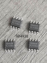 On Demand SD4938 PWM Controller IC 150V MOSFET Current Mode (SMPS Power Supply IC) MOQ IS 100PCS - four black eight-pin integrated circuit chips arranged in a square formation on a grey textured surface.