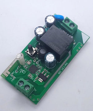 On-Off WiFi remote Switch home automation Module - a green printed circuit board with a black relay, two screw terminals, a button, and an LED indicator.
