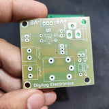 Only PCB For DIY PIR Motion Sensor Switch - a green square printed circuit board with labeled component slots for a relay, transistor, and resistors.