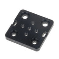 Openbuilds Special Slide Plate For Aluminum Profiles - a square, black metal plate featuring four large countersunk holes and five smaller threaded holes.