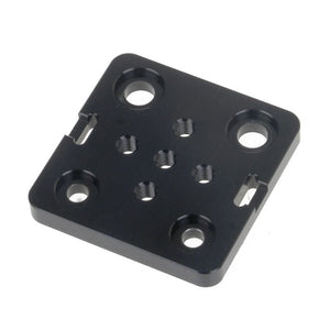 Openbuilds Special Slide Plate For Aluminum Profiles - a square, black metal plate featuring four large countersunk holes and five smaller threaded holes.
