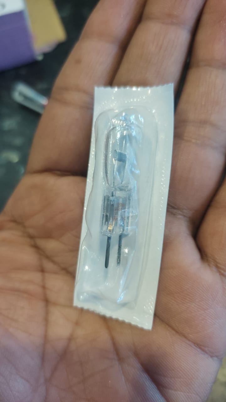 Optics Bulbs Medical Lamp of 150W 24V G6.35 Osram 64640 HLX FCS 24V 150W Light - a clear glass capsule lamp with two metal pins, shown inside its sealed transparent plastic packaging.