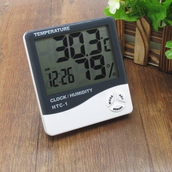 Original Htc 1 Temperature Humidity Meter Hygrometer - 30.3°C, 79% humidity, and 12:26 AM on its digital display with Mode, Adj, and Memory buttons.