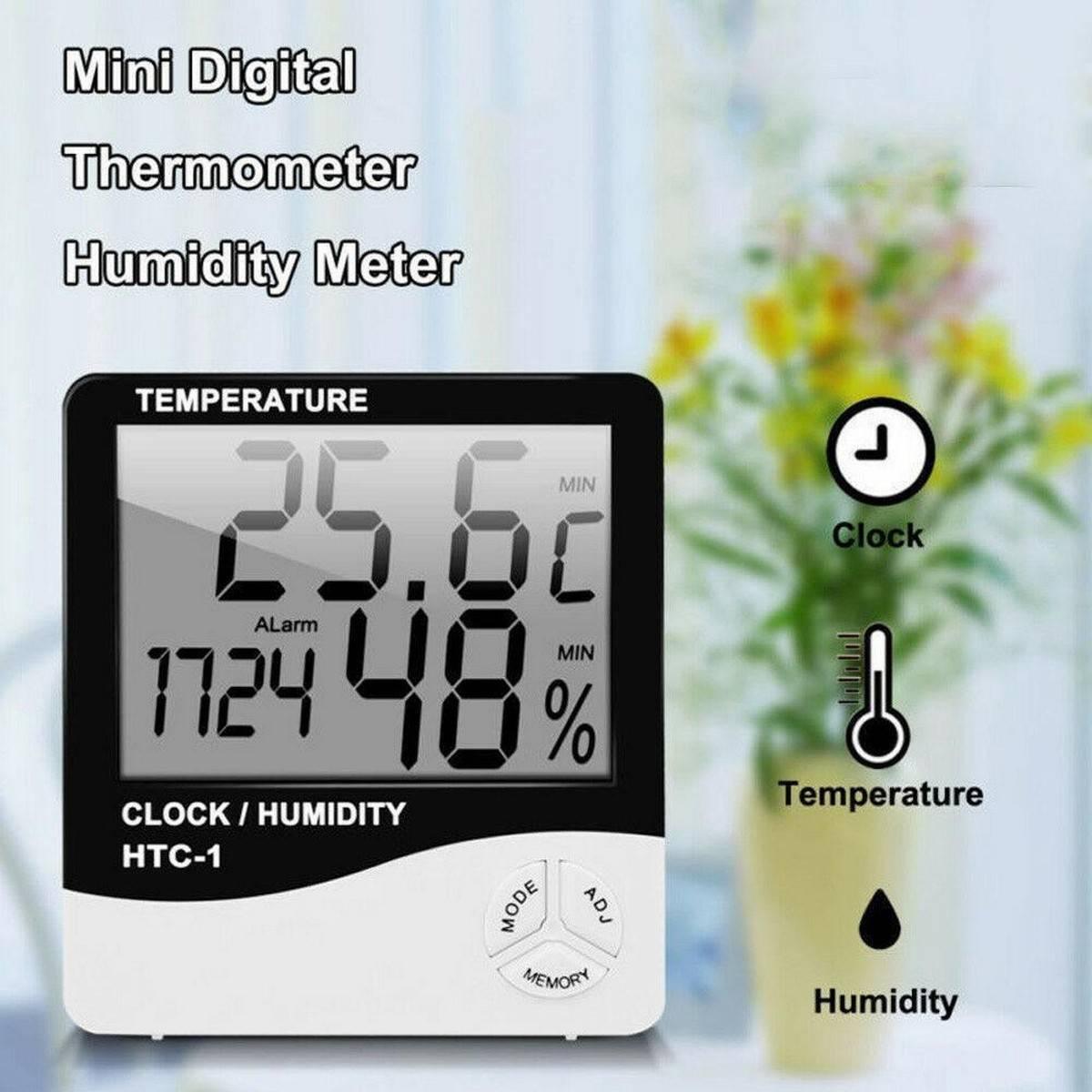 Original Htc 1 Temperature Humidity Meter Hygrometer - a white and black square device displaying 25.6°C, 17:24, and 48% with Mode, Adj, and Memory buttons.