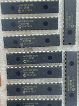 Original Inverter IC DSPIC30F2010 Microcontroller Price - a collection of black 28-pin DIP integrated circuits arranged on protective bubble wrap.
