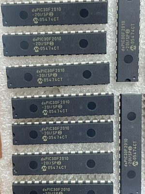 Original Inverter IC DSPIC30F2010 Microcontroller Price - a collection of black 28-pin DIP integrated circuits arranged on protective bubble wrap.
