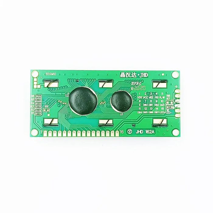 Original Jhd Green 1602 LCD 16x2 Character LCD Arduino Display For Arduino - the green circuit board back with two black epoxy blobs and a 16-pin connector.