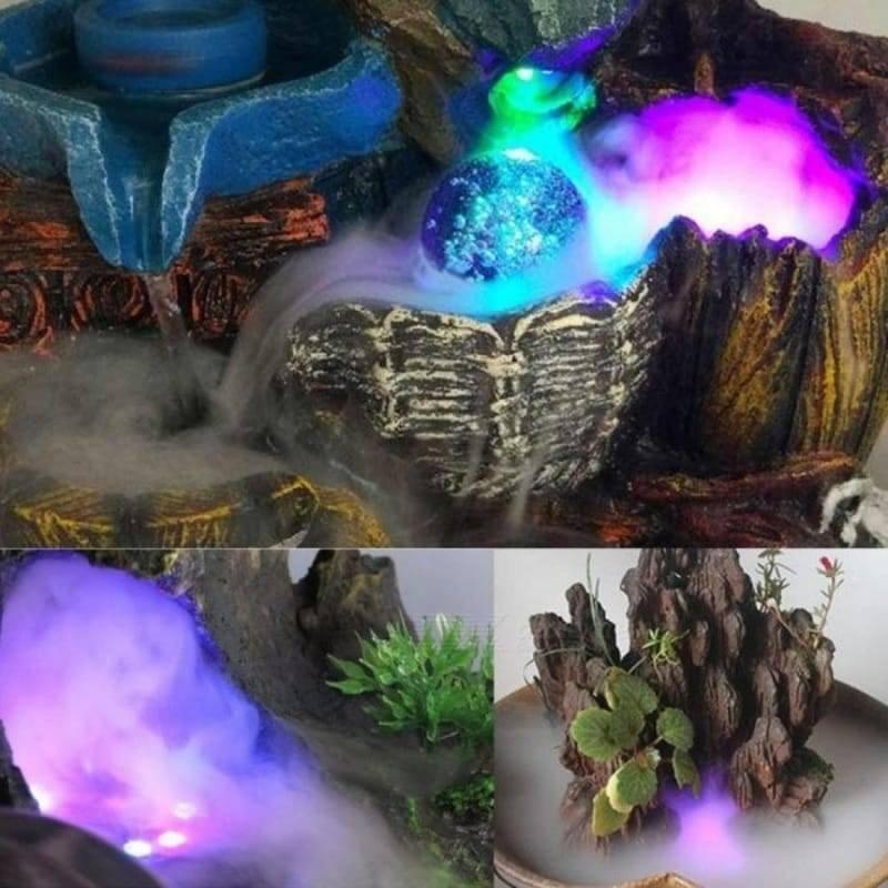 Original Ultrasonic Mist Maker Fogger 12 LED Colorful Light 24V 2A Humidifier - shown in use, creating colorful mist and light effects in decorative fountains.