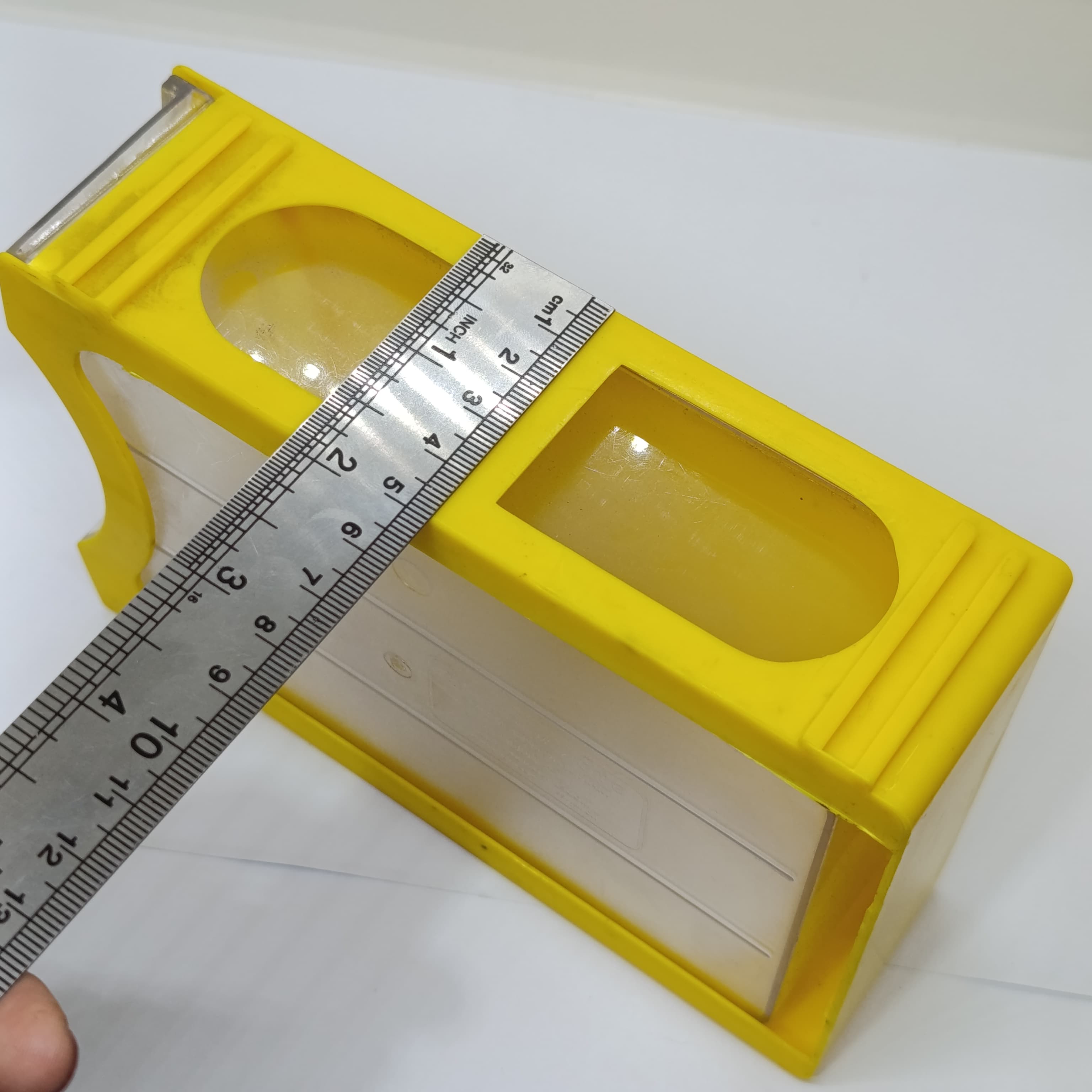 P-106 175MMX108MMX50MM Drawer For Storage Organizer Box - shown in yellow plastic with a metal ruler placed on top to indicate its dimensions.