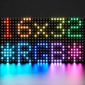 P10 Full Color LED Display Video Module 320x160mm - a rectangular grid of multicolored LEDs displaying the text "16x32" and "RGB" with symbols.