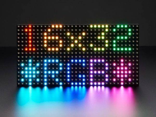 P10 Full Color LED Display Video Module 320x160mm - a rectangular grid of multicolored LEDs displaying the text "16x32" and "RGB" with symbols.