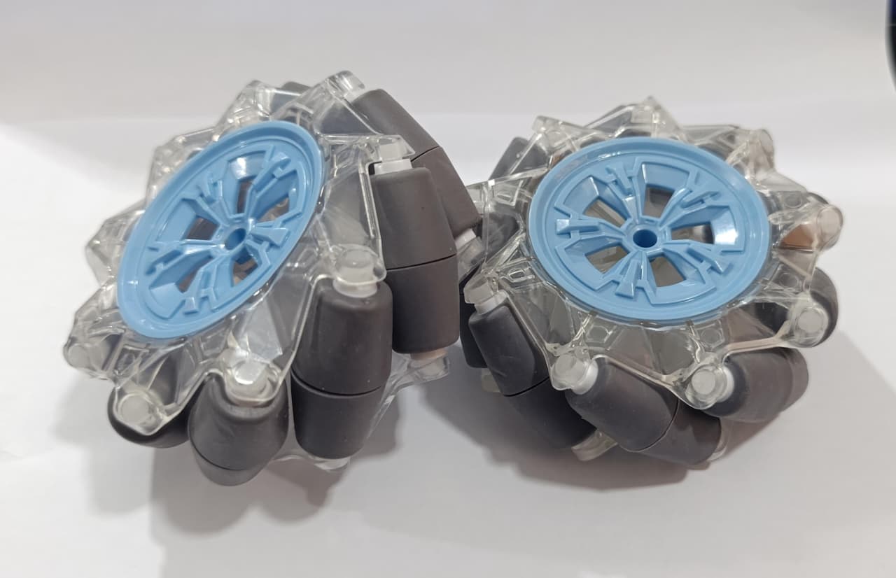 (Pair Left + Right) 95mm Mecanum Omni-directional Wheels - with clear plastic frames, light blue centers, and grey cylindrical rollers.